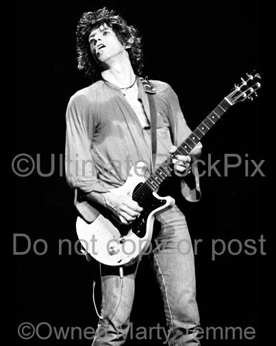 Photo of guitarist Keith Richards of The Rolling Stones playing a Les Paul Junior in concert in 1979 by Marty Temme