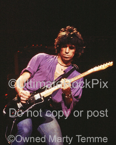 Photo of Keith Richards of The New Barbarians playing a Telecaster in concert by Marty Temme