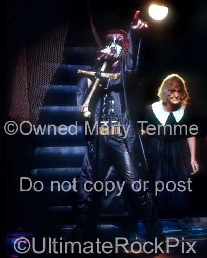 Photo of King Diamond performing onstage in 1988 by Marty Temme