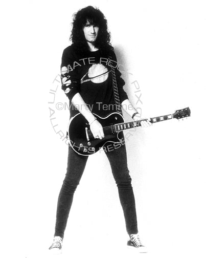 Black and white photo of Bruce Kulick of Kiss with his Les Paul during a photo shoot in 1993 by Marty Temme