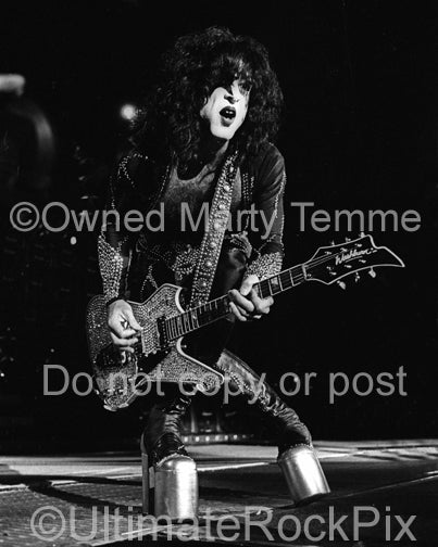 Black and white photo of Paul Stanley of Kiss in concert in 2000 by Marty Temme