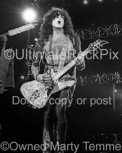 Photo of Paul Stanley of Kiss in concert in 2000 by Marty Temme