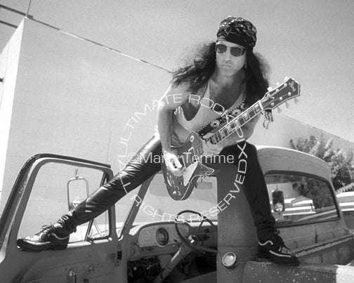 Black and white photo of Paul Stanley of Kiss during a photo shoot in 1993 by Marty Temme