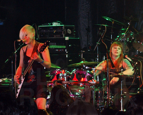 Photo of musicians Morgan and Mercedes Lander of Kittie in concert by Marty Temme