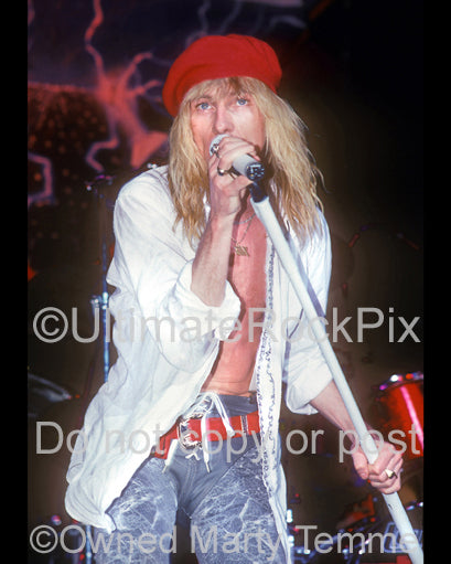 Photo of vocalist Steve Whiteman of Kix in concert in 1989 by Marty Temme