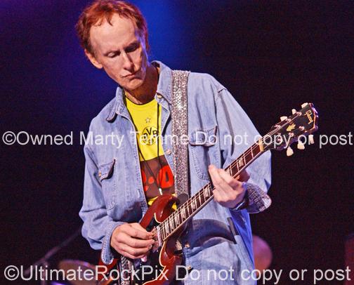 Photos of Guitar Player Robby Krieger Playing a Gibson SG in Concert in 2008 by Marty Temme