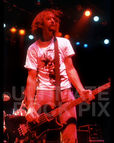 Photo of bassist Krist Novaselic of Nirvana onstage in 1991 by Marty Temme