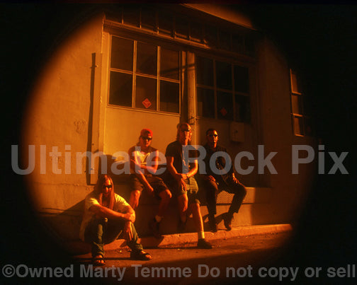 Photo of Josh Homme, John Garcia and Kyuss during a photo shoot in 1994 by Marty Temme