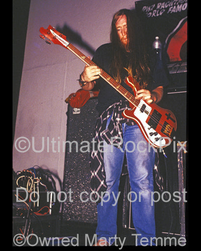 Photo of bass player Scott Reeder of Kyuss in concert in 1994 by Marty Temme