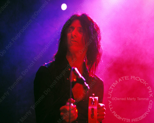 Photo of drummer Steve Riley of L.A. Guns in concert in 2005 by Marty Temme