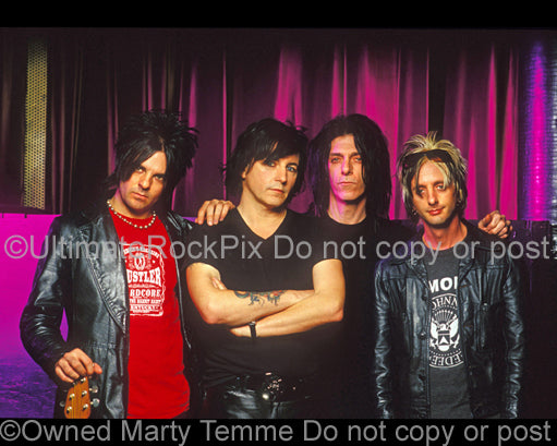 Photo of Stacey Blades, Phil Lewis, Steve Riley and Adam Hamilton of L.A. Guns during a photo shoot in 2005 by Marty Temme