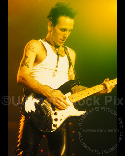 Photo of guitar player Tracii Guns of L.A. Guns in concert in 1991 in by Marty Temme