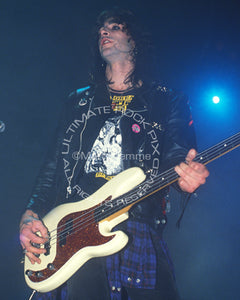 Photo of bassist Kelly Nickels of L.A. Guns in concert in 1991 by Marty Temme