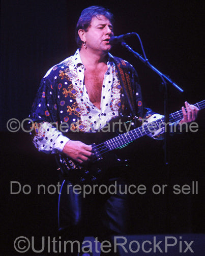 Photo of Greg Lake of Emerson, Lake & Palmer in concert in 1992 by Marty Temme