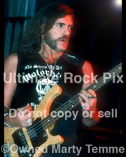 Photo of Lemmy Kilmister of Motorhead in concert in 1990 by Marty Temme
