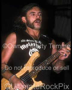 Photo of Lemmy Kilmister of Motorhead performing in concert in 1990 by Marty Temme