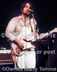 Photo of Lowell George of Little Feat playing an ash body Stratocaster in 1978 by Marty Temme