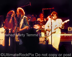 Photo of Lowell George, Bonnie Raitt and Paul Barrere of Little Feat in 1978 by Marty Temme