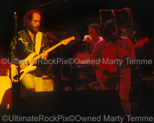 Photo of Lowell George, Richie Hayward and Paul Barrere of Little Feat in 1978 by Marty Temme