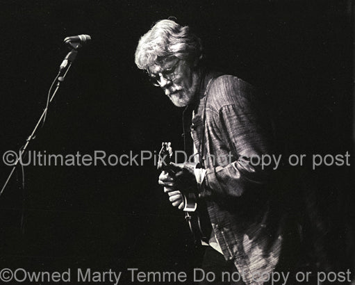 Photo of musician Fred Tackett of Little Feat in concert in 2002 by Marty Temme