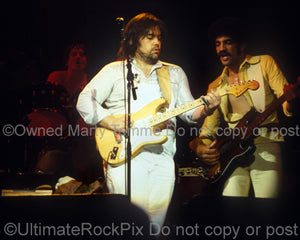 Photo of Lowell George and Kenny Gradney of Little Feat in 1978 by Marty Temme