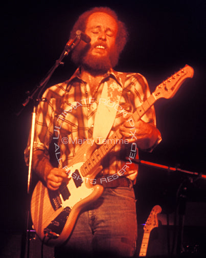 Photo of guitarist Paul Barrere of Little Feat in concert in 1978 by Marty Temme