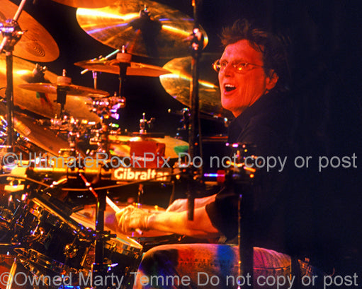 Photo of drummer Richie Hayward of Little Feat in concert in 2002 by Marty Temme