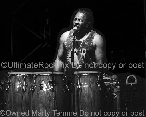 Black and white photo of percussionist Sam Clayton of Little Feat in concert in 2002 by Marty Temme