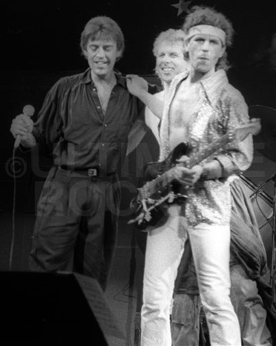 Photo of Randy California and Mark Lindsay in concert in 1985 by Marty Temme