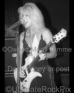 Black and white photo of Lita Ford in concert in 1991 by Marty Temme