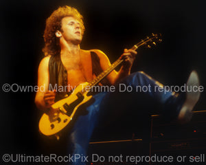 Photo of Paul Dean of Loverboy in concert in 1981 by Marty Temme