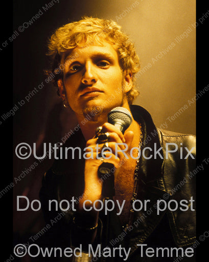 Photo of vocalist Layne Staley of Alice in Chains looking into the camera during a photo shoot by Marty Temme