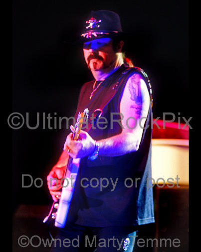 Photo of Hughie Thomasson of Lynyrd Skynyrd in concert in 2004 by Marty Temme