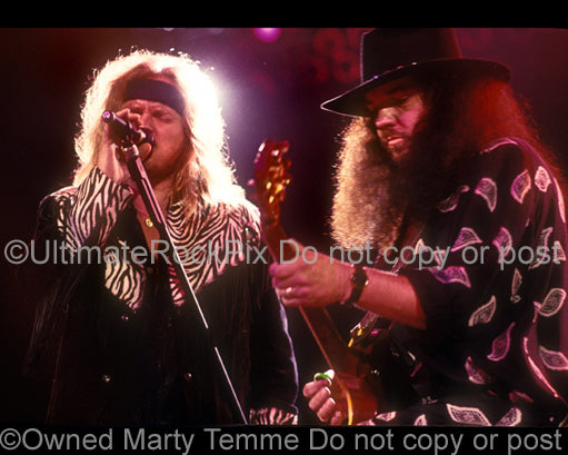 Photo of Johnny Van Zant and Gary Rossington of Lynyrd Skynyrd in 1991 by Marty Temme