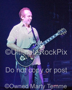 Photos of Phil Manzanera of Roxy Music Performing with David Gilmour of Pink Floyd in Concert by Marty Temme