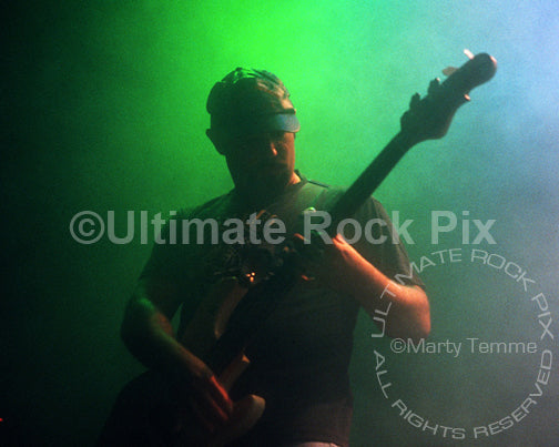 Photo of bass player Googe of Masters of Reality in concert in 1989 by Marty Temme