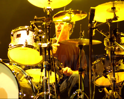 Photo of drummer Mickey Curry of Bryan Adams performing in concert by Marty Temme