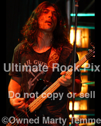 Photo of bassist Michael Denim Devin of Whitesnake in concert by Marty Temme