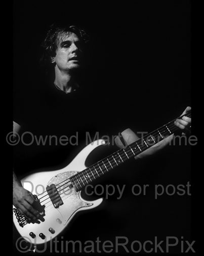 Black and white photo of Dave Ellefson of Megadeth in concert by Marty Temme