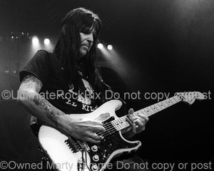 Black and White Photos of Guitar Player Mick Mars of Motley Crue Playing Slide Guitar in Concert by Marty Temme