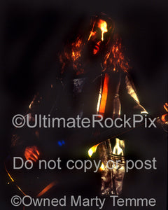 Photo of bassist Paul Barker of Ministry in concert in 1992 by Marty Temme