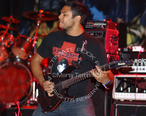 Photo of guitar player Misha Mansoor of Periphery in concert by Marty Temme