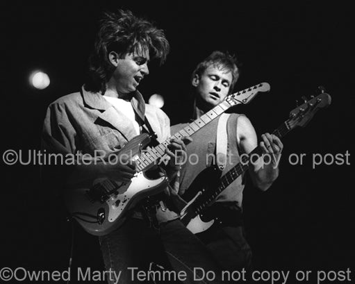 Photo of Steve Farris and Richard Page of Mr. Mister in concert in 1984 by Marty Temme