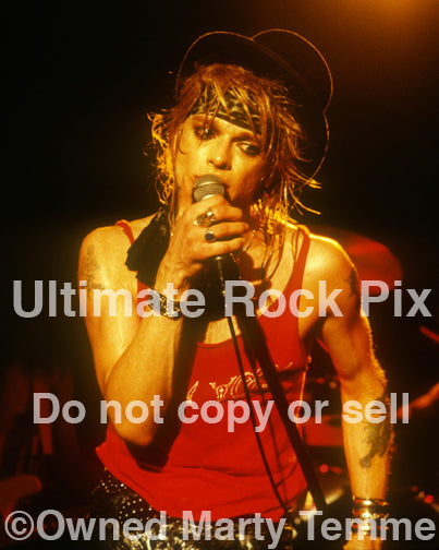 Photo of singer Michael Monroe in concert in 1989 by Marty Temme