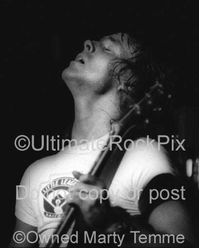 Black and white photo of Ronnie Montrose in concert in 1974 by Marty Temme