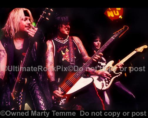 Photos of Vince Neil, Nikki Sixx and Mick Mars of Motley Crue in Concert by Marty Temme