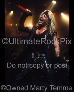 Photos of Vince Neil of Motley Crue in Concert in 2000 by Marty Temme