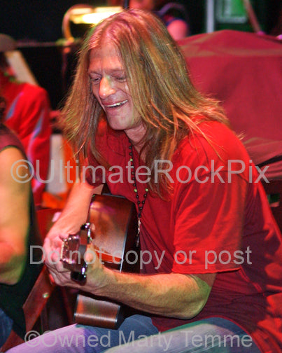 Photo of guitarist Mitch Perry in concert in 2010 by Marty Temme