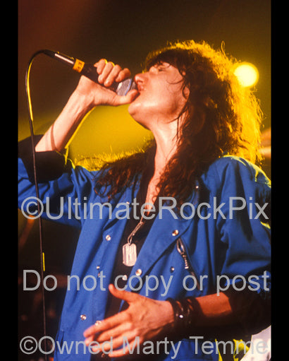 Photo of singer Eric Martin of Mr. Big in concert in 1991 in Los Angeles, California by Marty Temme