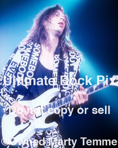 Photo of guitarist Paul Gilbert of Mr. Big in concert in 1991 by Marty Temme